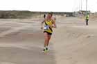 Elaine Leslie (Jarrow) battles her way through the wind and sand storm to win the womens Sand Dancer, South Shields.